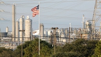 US flag and a BASF manufacturing site US flag and a BASF manufacturing site