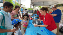 BASF Central (Clemson) site director Theresa Vaughn walks a group of children through an experiment during the iMAGINE Upstate Festival in Greenville, South Carolina.