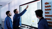 The modern control station in an intermediate products plant at the Ludwigshafen site is where all information relating to the plant comes together. Using numer-ous screens, the plant operators control and monitor the highly complex chemical processes. On the “Collaboration Board,” a large touchscreen in the center of the room, the employees call up all the important information at the same time and can thus work in an effective and concentrated manner. Assistant Asset Manager Daniel Kirschner (center) discusses a plant flow chart with his colleagues at the “Collaboration Board.” The plant for intermediate products is made up of 16 plant sections and manufactures a broad portfolio of around 50 intermediate products such as amines or diols. BASF customers need these prod-ucts for applications including the produc-tion of coatings for the automotive industry, pharma or crop protection products.