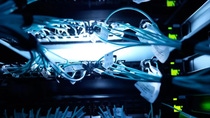 Close up shot of a server with many wires.