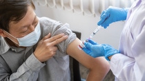 Doctor woman injecting Covid-19 coronavirus vaccine for old man. Fight against Covid-19 coronavirus Concept. Doctor woman injecting Covid-19 coronavirus vaccine for old man. Fight against Covid-19 coronavirus Concept.
