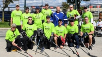 Employees from Magna International and BASF Canada are joined by Mark Napier, former Stanley Cup winner with the Montreal Canadiens and the Edmonton Oilers, at the Road Hockey to Conquer Cancer tournament in Toronto.