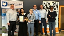 Members of the leadership team at the BASF Coatings site in Greenville, Ohio accept the award for 2025 Business of the Year from the Darke County Community Improvement Corporation.