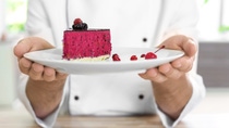 Chef holding delicious berry cheesecake, closeup; Shutterstock ID 714513175; PO: 2564380; Job: job; Client: BASF SE; Other: other Chef holding delicious berry cheesecake, closeup; Shutterstock ID 714513175; PO: 2564380; Job: job; Client: BASF SE; Other: other
