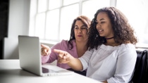 Mother and Student at the Laptop Mother and Student at the Laptop