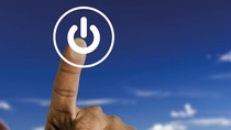 A picture of a finger pushing a start button A picture of a finger pushing a start button