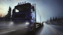  truck driving on country-road/photographic-retouching