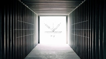 Inside a dark, empty shipping container looking towards the open container doors - scientific equations and sketches are overlaid on a bright square of light coming through the open doors.