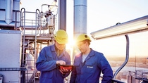 Master of Maintenance Christian Kieweg (l.) and Plant Operator Kevin Noack during inspection at a PBT plant on the production site of BASF Schwarzheide, Germany. A state-of-the art plant for the production of cathode materials is to be built at this site in 2022.