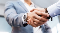 Handshake of businessmen greeting each other