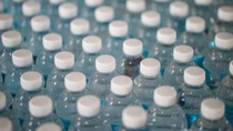 overview of plastic bottles with white top 