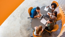 People sitting together at one table.