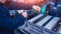 Charging the batteries of the elecric motor. Disassembling the battery of an electric vehicle engine. Car service Charging the batteries of the elecric motor. Disassembling the battery of an electric vehicle engine. Car service