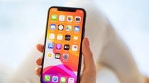 Riga, Latvia - December 3, 2019: Woman using Apple iPhone 11 Pro. Riga, Latvia - December 3, 2019: Woman using Apple iPhone 11 Pro.
