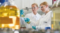 Biology and chemical laboratory technician rate a detergent formula in a laboratory Biology and chemical laboratory technician rate a detergent formula in a laboratory