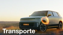 Um SUV claro com o logotipo da BASF na grade dianteira, em uma paisagem ao pôr do sol, com um anel de luz brilhante perto da roda dianteira. O texto diz: "Transporte."