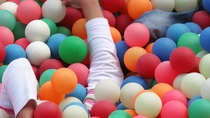 child in ball pond child in ball pond