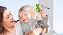 Mother and children cuddling and playing Mother and children cuddling and playing