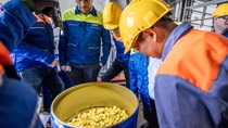 BASF team checks the X3D catalysts in a barrel. BASF team checks the X3D catalysts in a barrel.