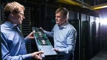Stephan Schenk, PhD, and Marcel Michael (right) at the commissioning of BASF’s supercomputer in Ludwigshafen.