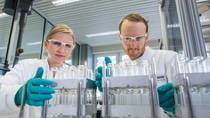 Two employees working for research and development in a BASF Ludwigshafen lab environment. Two employees working for research and development in a BASF Ludwigshafen lab environment.