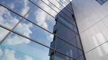 The facade is designed in six different grey-blue nuances that change depending on the perspective and the daylight, The facade is designed in six different grey-blue nuances that change depending on the perspective and the daylight,