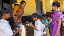 Serving meals at an Indian school Serving meals at an Indian school