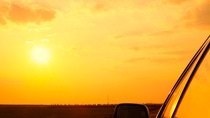 Side detail of a car in the sunset Side detail of a car in the sunset