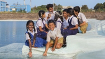 As part of BASF’s “Water Education Project,” students at Shri Venkataramana Higher Primary School in Kulai (Mangalore), together with their science teacher Gopala V, are collecting samples from the groundwater reservoir located near the BASF production facility. Using the Water Testing Toolkit, they can test the physical, chemical, and biological parameters of the water sample.