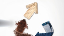 Three arrows made of chopsticks, denim and coffee grounds forming a triangle  Three arrows made of chopsticks, denim and coffee grounds forming a triangle