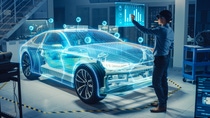 Automotive Engineer Use Virtual Reality Headset for Virtual Electric Car 3D Model Design Analysis and Improvement. 3D Graphics Visualization Shows Fully Developed Vehicle Prototype Analysed, Optimized Automotive Engineer Use Virtual Reality Headset for Virtual Electric Car 3D Model Design Analysis and Improvement. 3D Graphics Visualization Shows Fully Developed Vehicle Prototype Analysed, Optimized