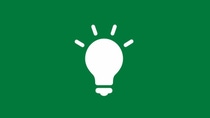 White lightbulb icon with rays on a green background, representing learning, ideas, and continuous development.