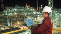 An employee in front of the acrylic acid plant at the Kuantan site. An employee in front of the acrylic acid plant at the Kuantan site.