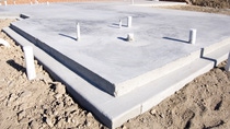 Picture of a concrete slab for a house. Taken during the early morning. Picture of a concrete slab for a house. Taken during the early morning.