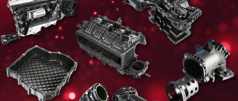 various automotive parts made with Ultramid, in front of a red backdrop