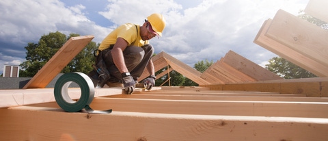 6105-05396035
© Masterfile Royalty-Free
Model Release: Yes
Property Release: Yes
Carpenter marking spacing of rafters with a pencil
