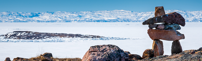 Inuit Inukshuk in a snowy landscape