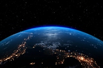 Earth viewed from space with a visible atmosphere, clouds, and illuminated regions. Earth viewed from space with a visible atmosphere, clouds, and illuminated regions.