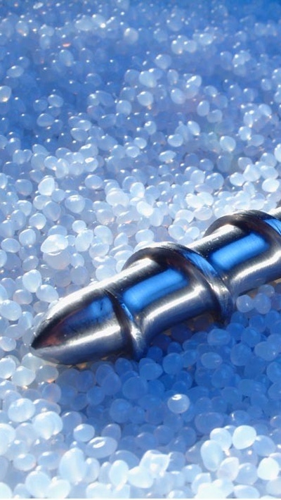 End of screw on top of small white beaded material End of screw on top of small white beaded material