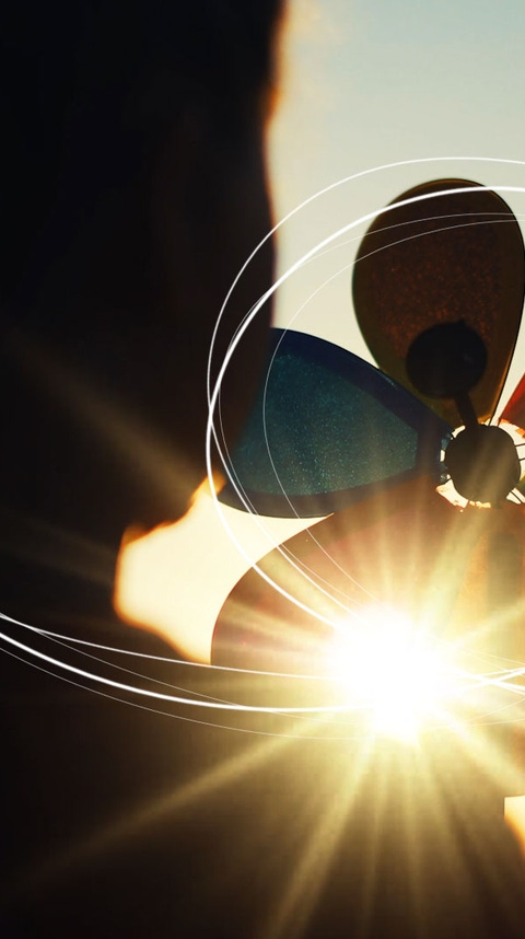 Young girl with Pinwheel in sun   