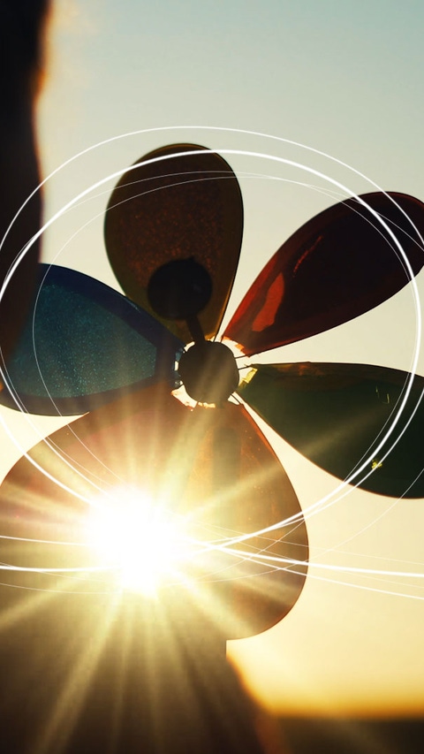 Young girl with Pinwheel in sun    Young girl with Pinwheel in sun