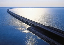 Road expanding across big area of water 