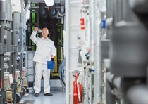 Technician Steffen Dec controls the power lines in a pilot plant for biotechnological processes.  To advance its development of bio-based solutions and fermentation processes using digital technologies, BASF is collaborating with Riffyn on its global experiment data capture platform. 