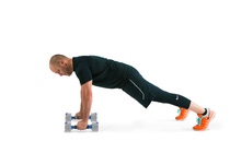Dumbbell Push up start position (Side view). (Benjamin Chasteen/Epoch Times) Dumbbell Push up start position (Side view). (Benjamin Chasteen/Epoch Times)