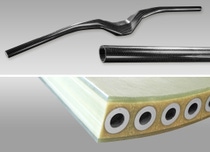 Auf der Composite-Messe JEC in Paris zeigt die BASF unter anderem ein faserverstärktes Bauteil aus dem Polyurethanharz Elastocoat® C6226-100, entwickelt mit dem Partner Fiberline Composites AS. Darüber hinaus veranschaulicht ein Technologiedemonstrator eines Mountainbike-Lenkers, dass komplexe Hohlbauteile in automatisierter Großserie zu wettbewerbsfähigen Kosten gefertigt werden können.	At the JEC World Composites Show BASF is presenting, among other things, a fiber-reinforced component made from Elastocoat® C6226-100 polyurethane resin which was developed together with Fiberline Composites A/S in Denmark. Furthermore a technology demonstrator for mountain bike handlebars illustrates how complex hollow components in automated high-volume series can be produced at competitive costs.