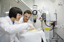 Karen Kong (left), lab chemist, and Daniel Freidank (right), lab manager, checks the foaming process of a polyurethane block foam. Polyurethane is used in a wide variety of applications to create all manner of consumer and industrial products that play a crucial role in making our lives more convenient and comfortable while helping enhance energy efficiency.
Print free of charge. Copyright by BASF

Karen Kong (links), Chemikerin, und Daniel Freidank (rechts), Laborleiter, prüfen den Aufschäumprozess eines Polyurethan-Schaumstoffblocks. Polyurethane werden in vielen Anwendungen verwendet, um unterschiedliche Konsum- und Industriegüter herzustellen. Diese verbessern unsere Lebensqualität und helfen dabei die Energieeffizienz zu steigern.
Abdruck honorarfrei. Copyright by BASF.   
