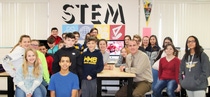 STEM teacher Greg Brovont with his seventh-grade students, one of the classrooms that will benefit from BASF’s $9,000 contribution to Wyandotte Public schools.