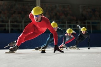 Four ice skaters accelerating