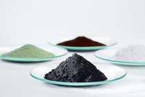 Key to powerful battery materials: Precursor cathode active materials (green and brown powder), lithium carbonate (white powder) and cathode active materials (black powder). Key to powerful battery materials: Precursor cathode active materials (green and brown powder), lithium carbonate (white powder) and cathode active materials (black powder).