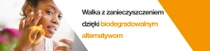 Kobieta nakłada na twarz produkt biodegradowalny. Na jej dłoni unosi się świetlny wir. Tekst brzmi: „Walka z zanieczyszczeniami dzięki biodegradowalnym alternatywom”.